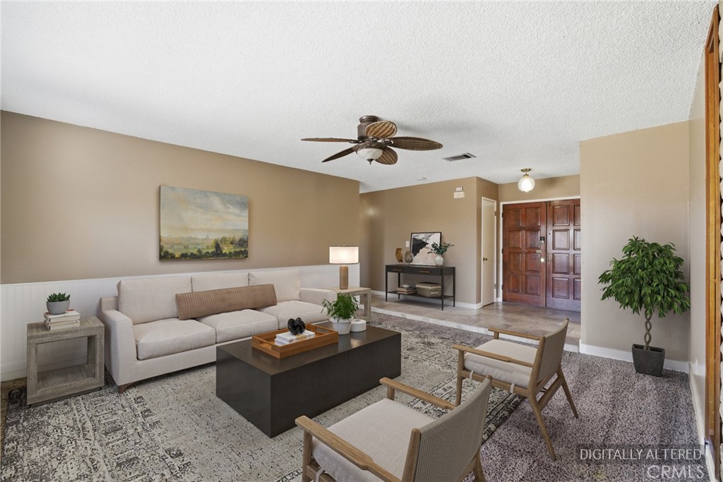 2234 Carter Way Hanford, CA 93230 - Photo 4 of 22 a living room with furniture and a potted plant