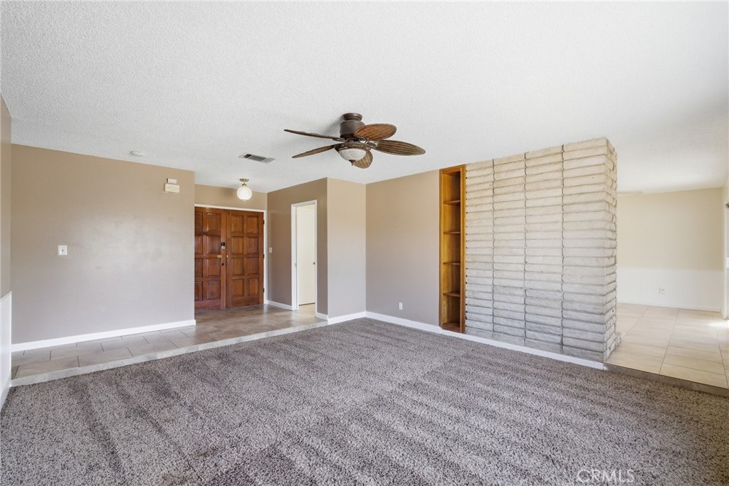 2234 Carter Way Hanford, CA 93230 - Photo 5 of 22 a view of an empty room with a ceiling fan