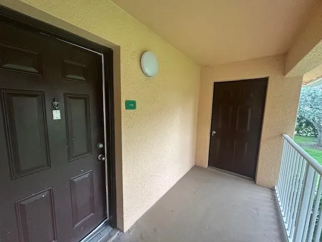 a view of an outdoor space and basketball court