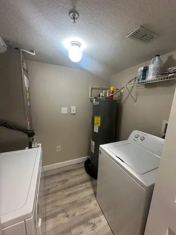 a room with a washer and dryer