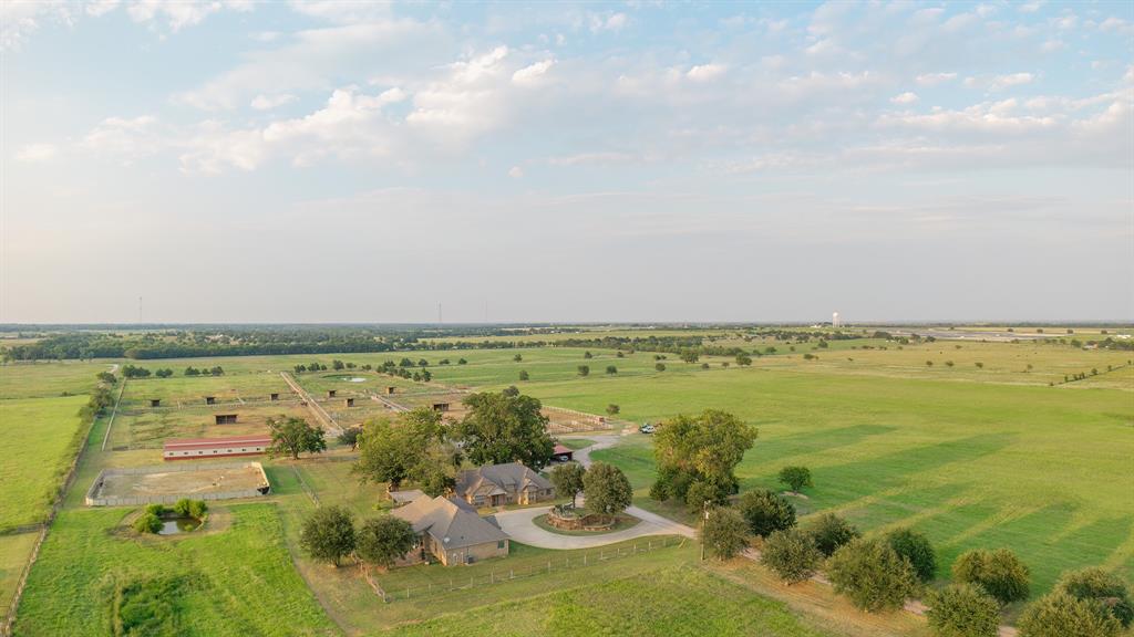 777 Stiles Road Whitesboro, TX 76273 - Photo 25 of 37 a view of a lake with a city