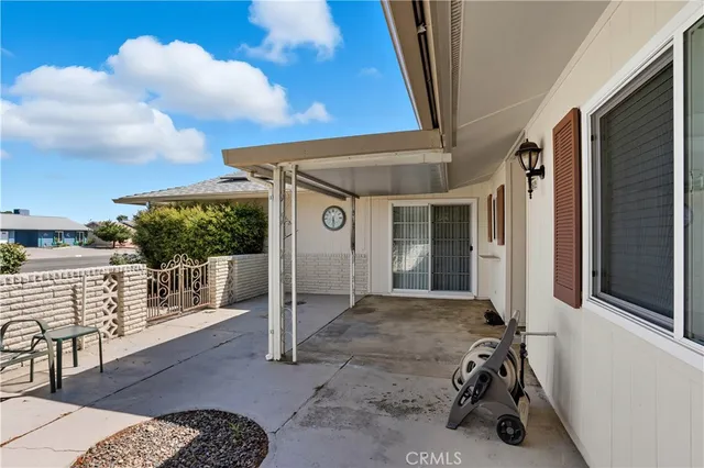 a view of a porch with furniture
