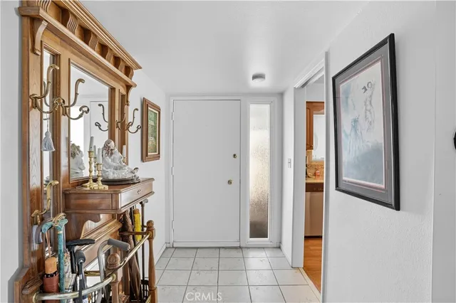 a large kitchen with a lot of counter space and windows