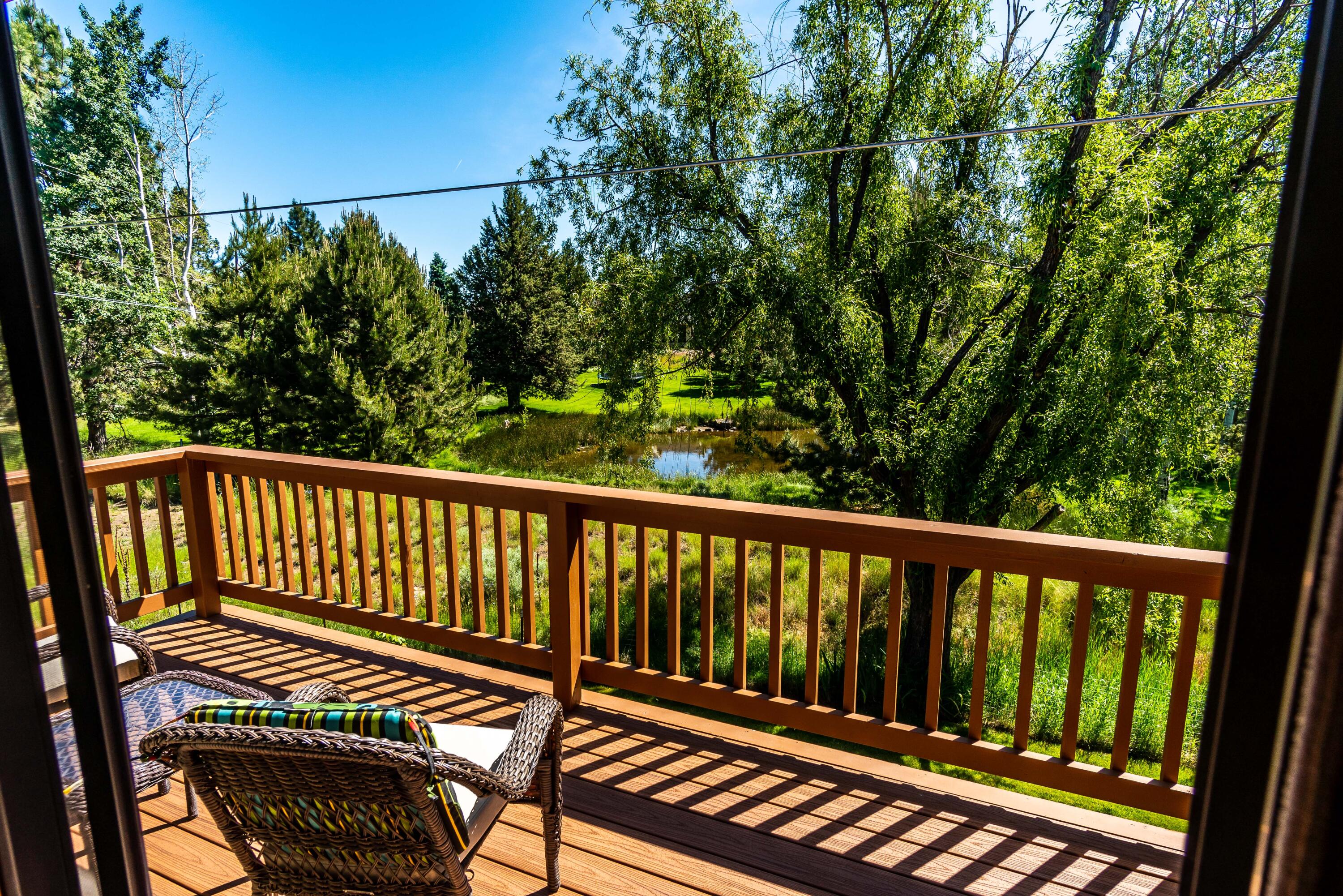 63536 Vogt Road Bend, OR 97701 - Photo 31 of 44 a view of balcony with wooden floor