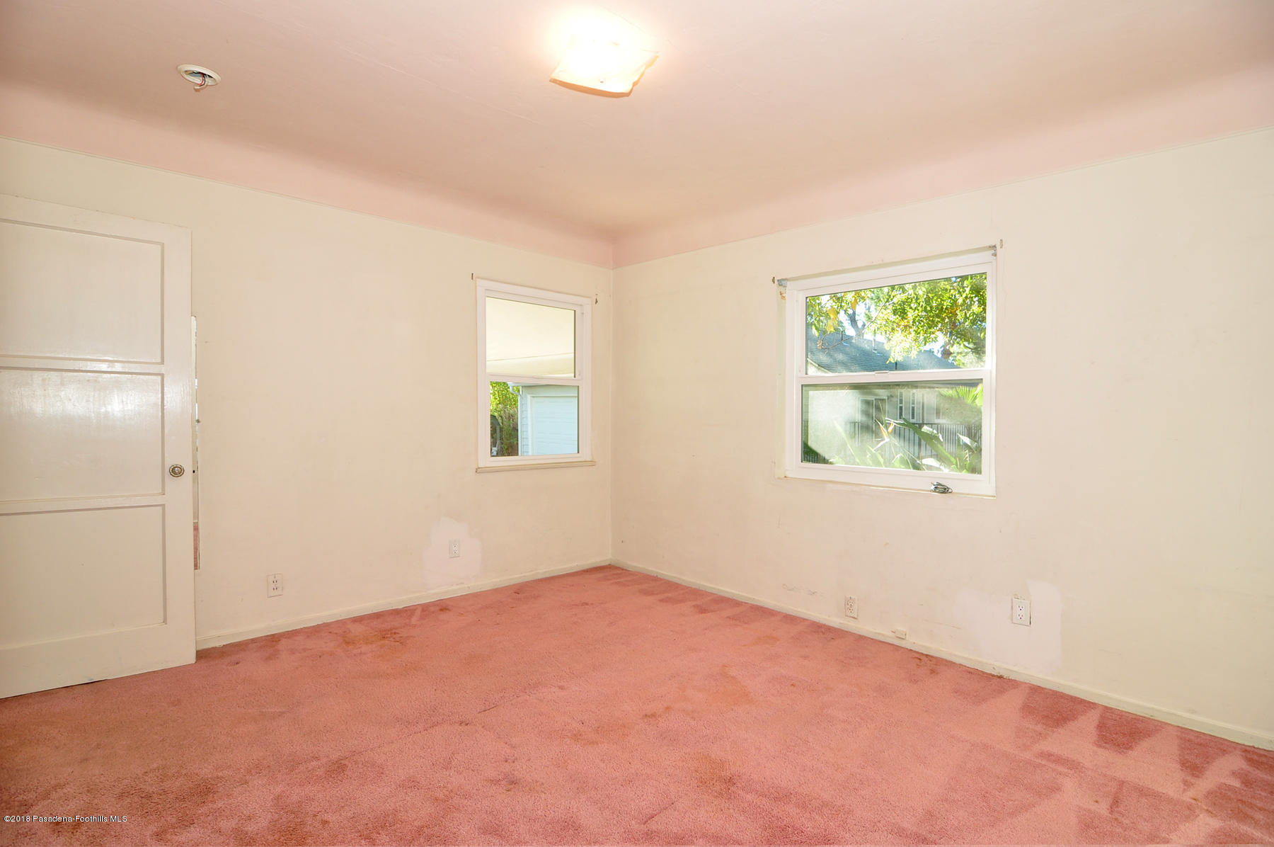 2011 Minoru Drive Altadena, CA 91001 - Photo 11 of 26 an empty room with windows