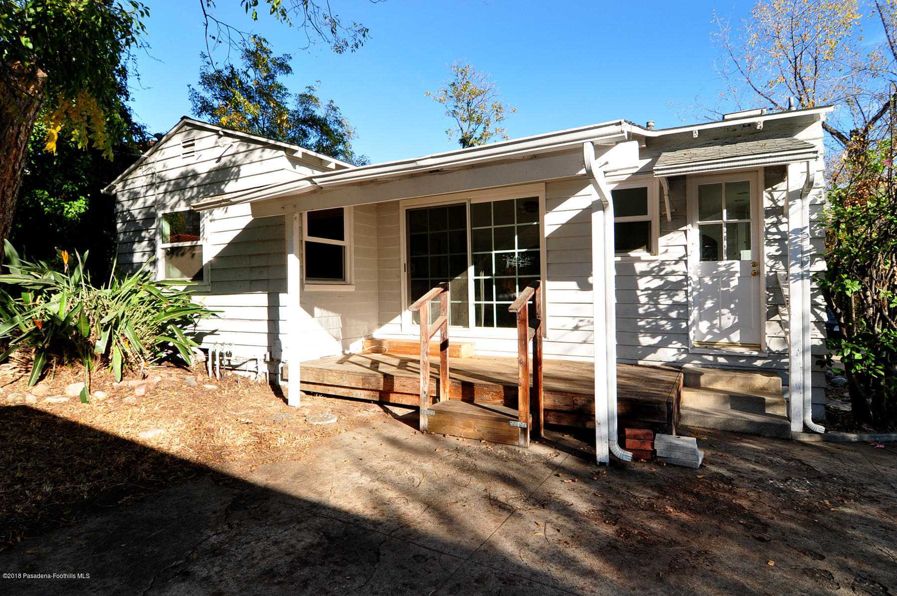 2011 Minoru Drive Altadena, CA 91001 - Photo 14 of 26 a view of a house with backyard porch and sitting area