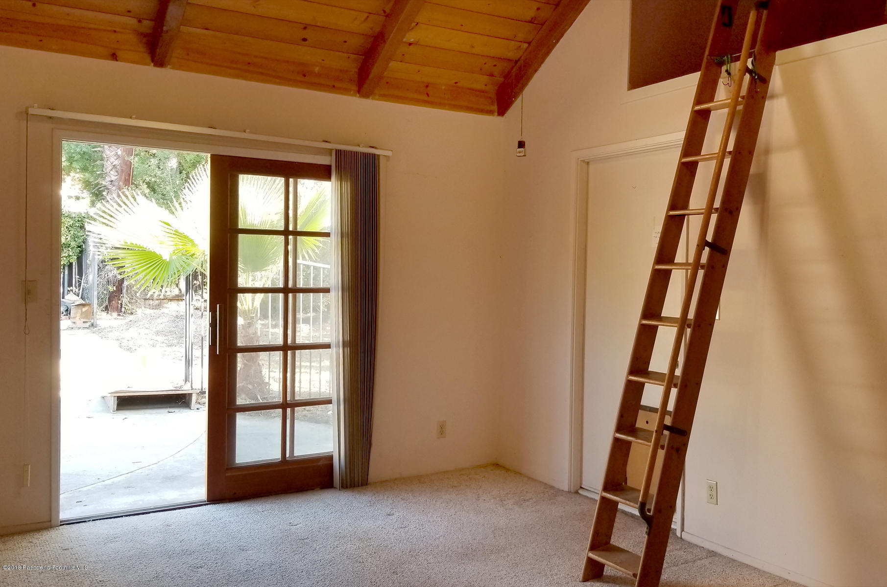 2011 Minoru Drive Altadena, CA 91001 - Photo 18 of 26 a view of an empty room with a window