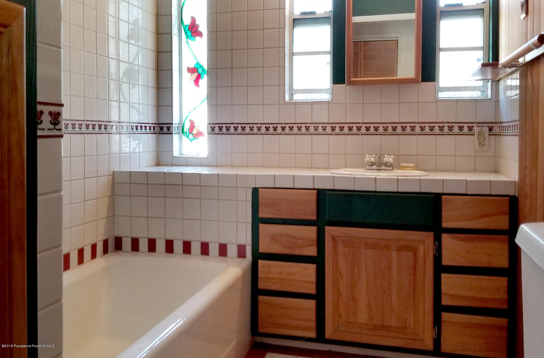 2011 Minoru Drive Altadena, CA 91001 - Photo 20 of 26 a bathroom with a sink and a shower