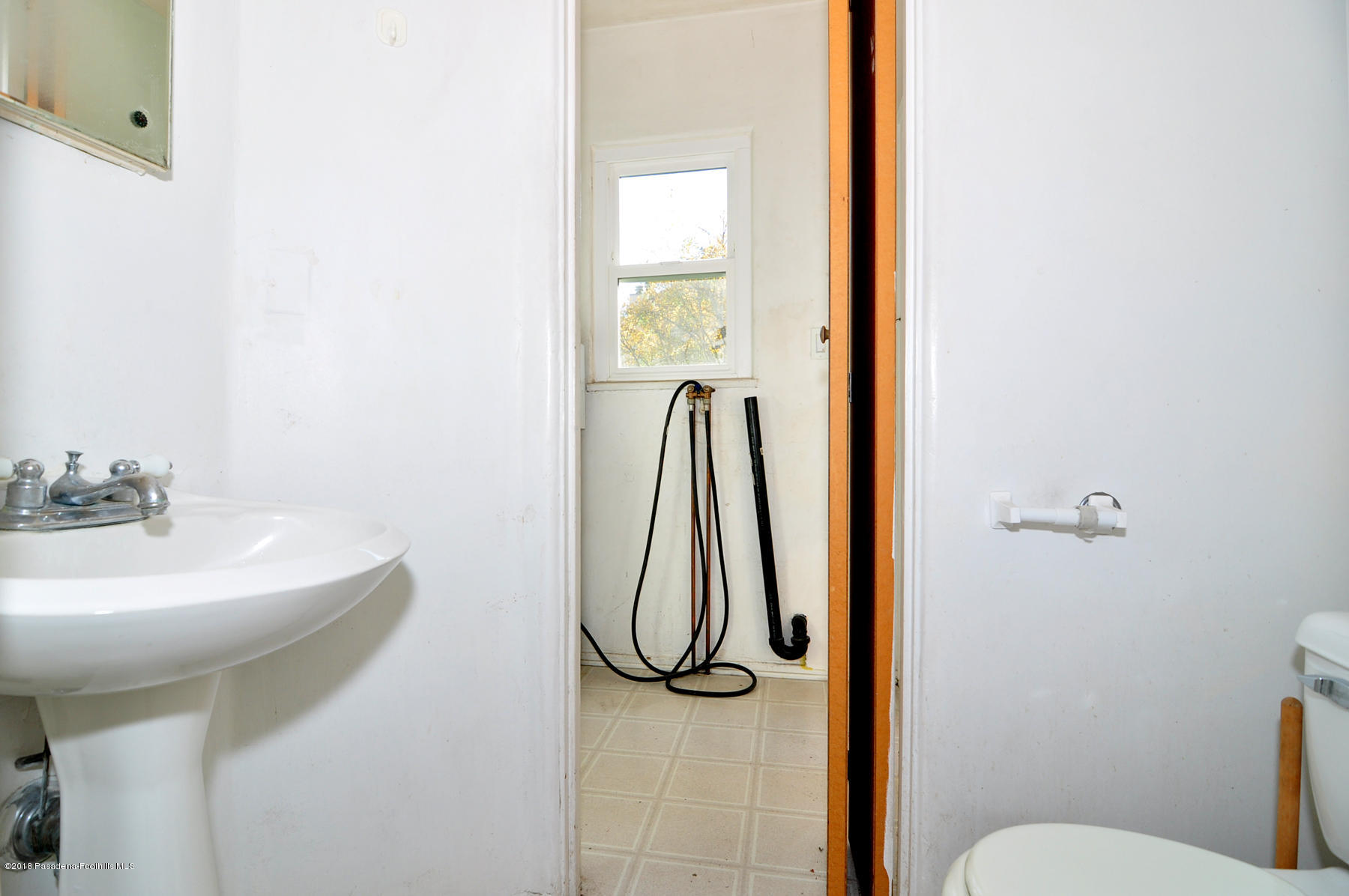 2011 Minoru Drive Altadena, CA 91001 - Photo 10 of 26 a bathroom with a sink toilet and shower