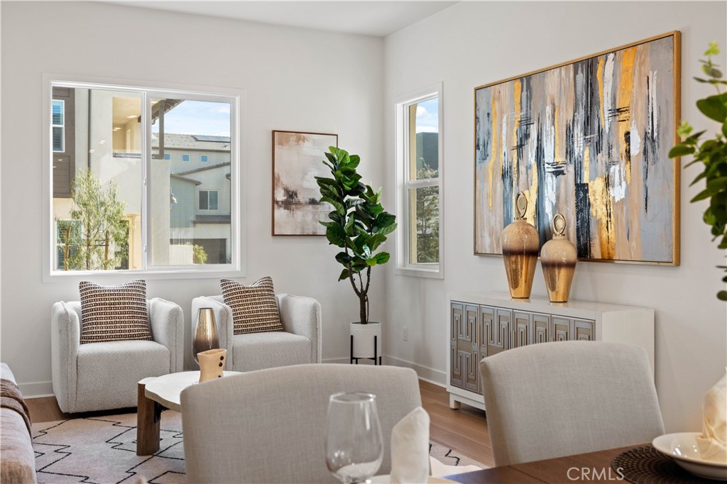 307 Baluster Irvine, CA 92618 - Photo 11 of 29 a living room with furniture and a large window
