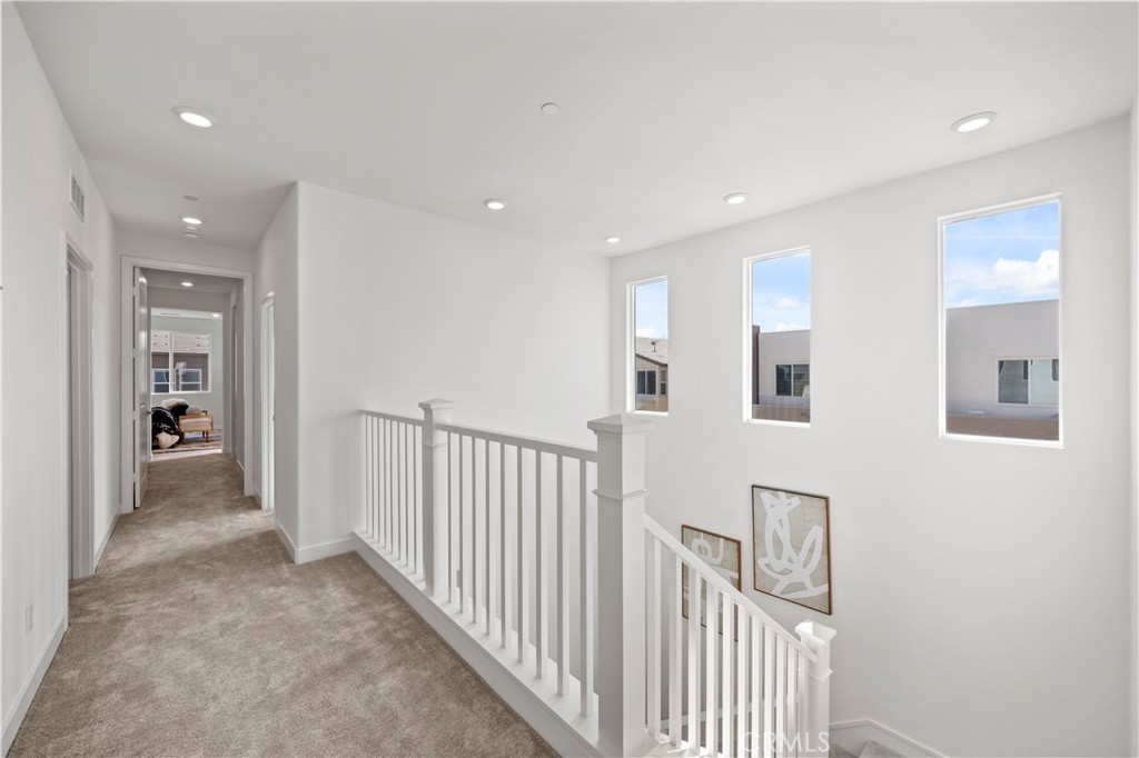307 Baluster Irvine, CA 92618 - Photo 14 of 29 a view of a hallway with closet area