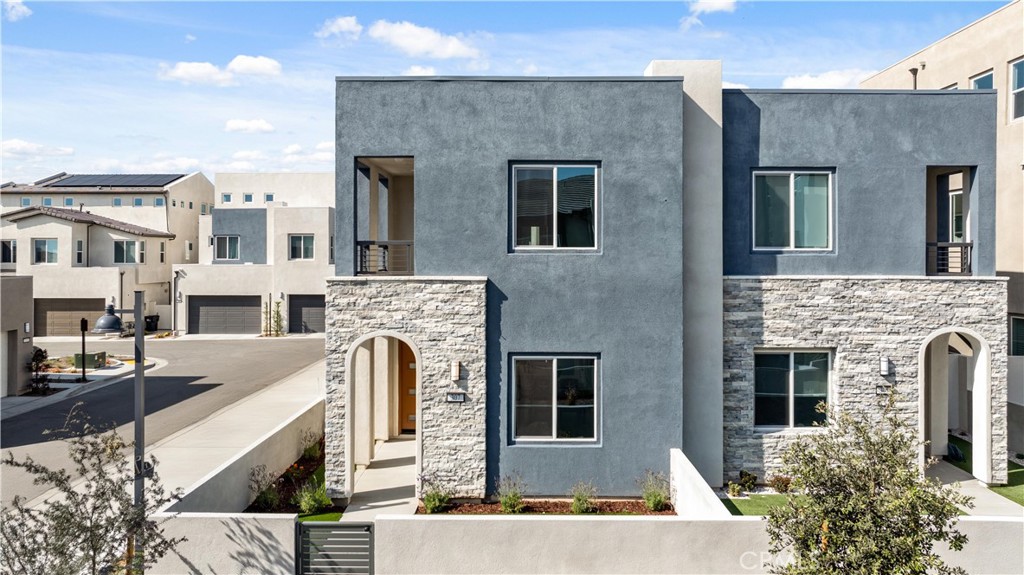 307 Baluster Irvine, CA 92618 - Photo 2 of 29 a view of a building with many windows