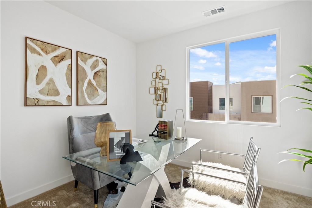 307 Baluster Irvine, CA 92618 - Photo 24 of 29 a view of a workspace with furniture and a window
