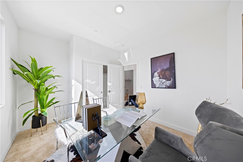 307 Baluster Irvine, CA 92618 - Photo 25 of 29 a living room with furniture and a potted plant