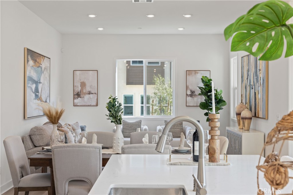 307 Baluster Irvine, CA 92618 - Photo 7 of 29 a living room with furniture and a large window
