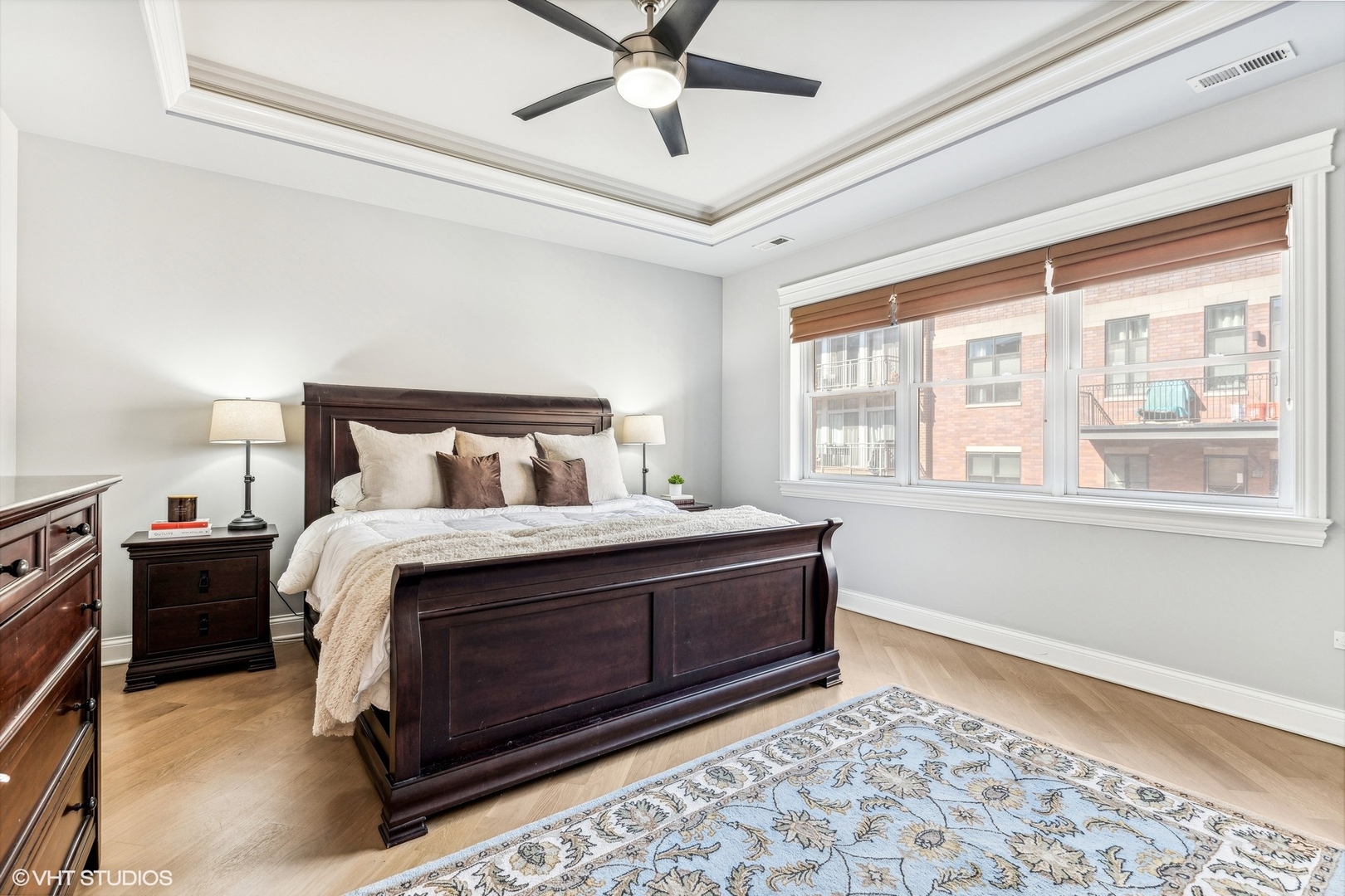 100 South Sangamon Street, Unit 3S Chicago, IL 60607 - Photo 16 of 26 a bedroom with a bed and a window