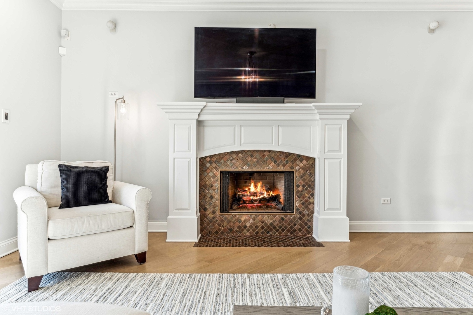 100 South Sangamon Street, Unit 3S Chicago, IL 60607 - Photo 6 of 26 a living room with furniture and a fireplace