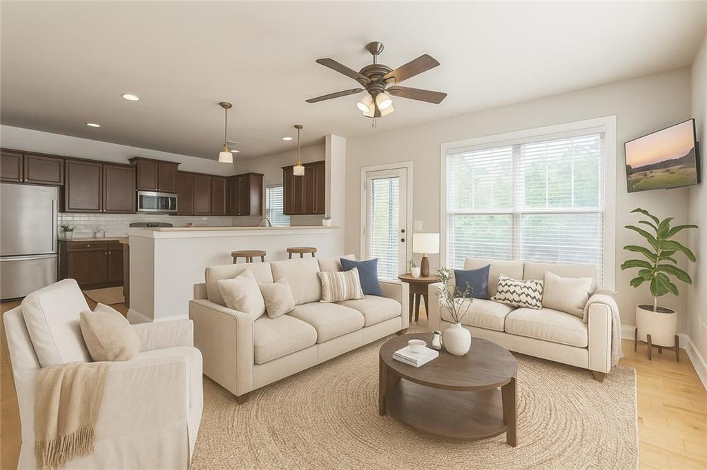 242 16th Street Northwest, Unit 14 Atlanta, GA 30363 - Photo 10 of 31 a living room with furniture kitchen and a large window