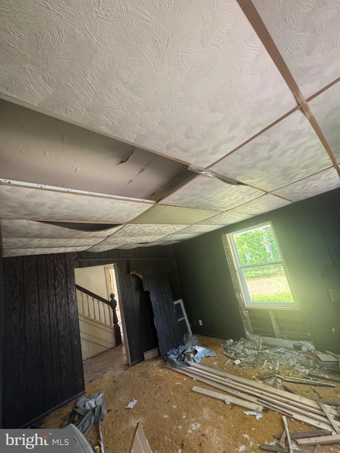 1650 Skinners Turn Road Owings, MD 20736 - Photo 58 of 66 a bedroom with a bed and a window