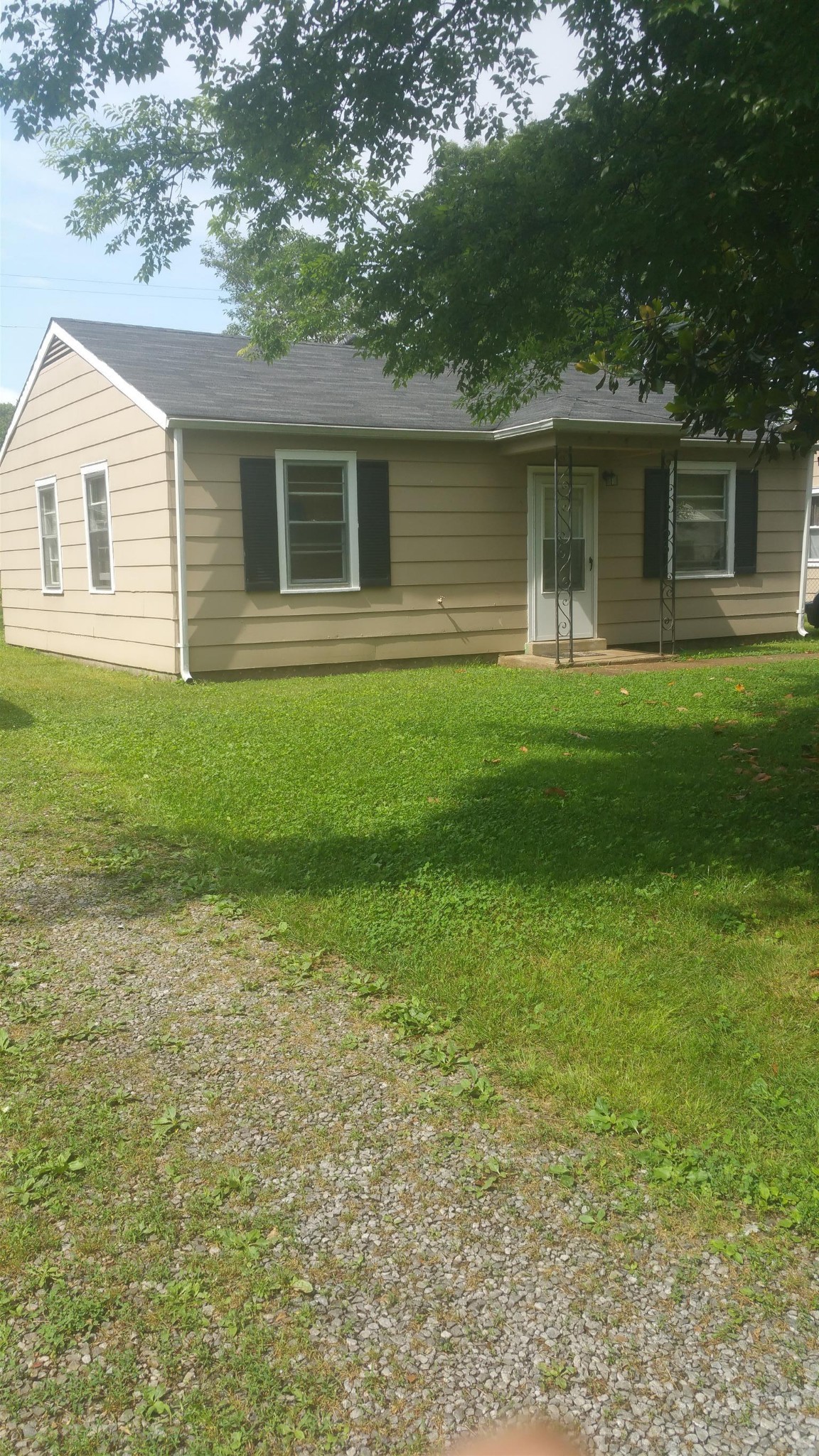 229 Burch Road Clarksville, TN 37042 - Photo 1 of 1 a front view of a house with a garden