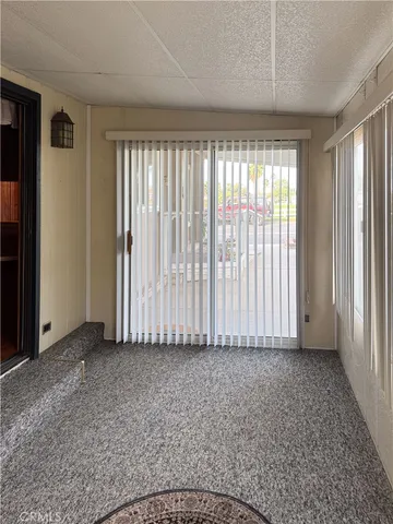 a view of walk in closet with wooden floor