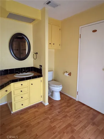 a view of a porch with a bench