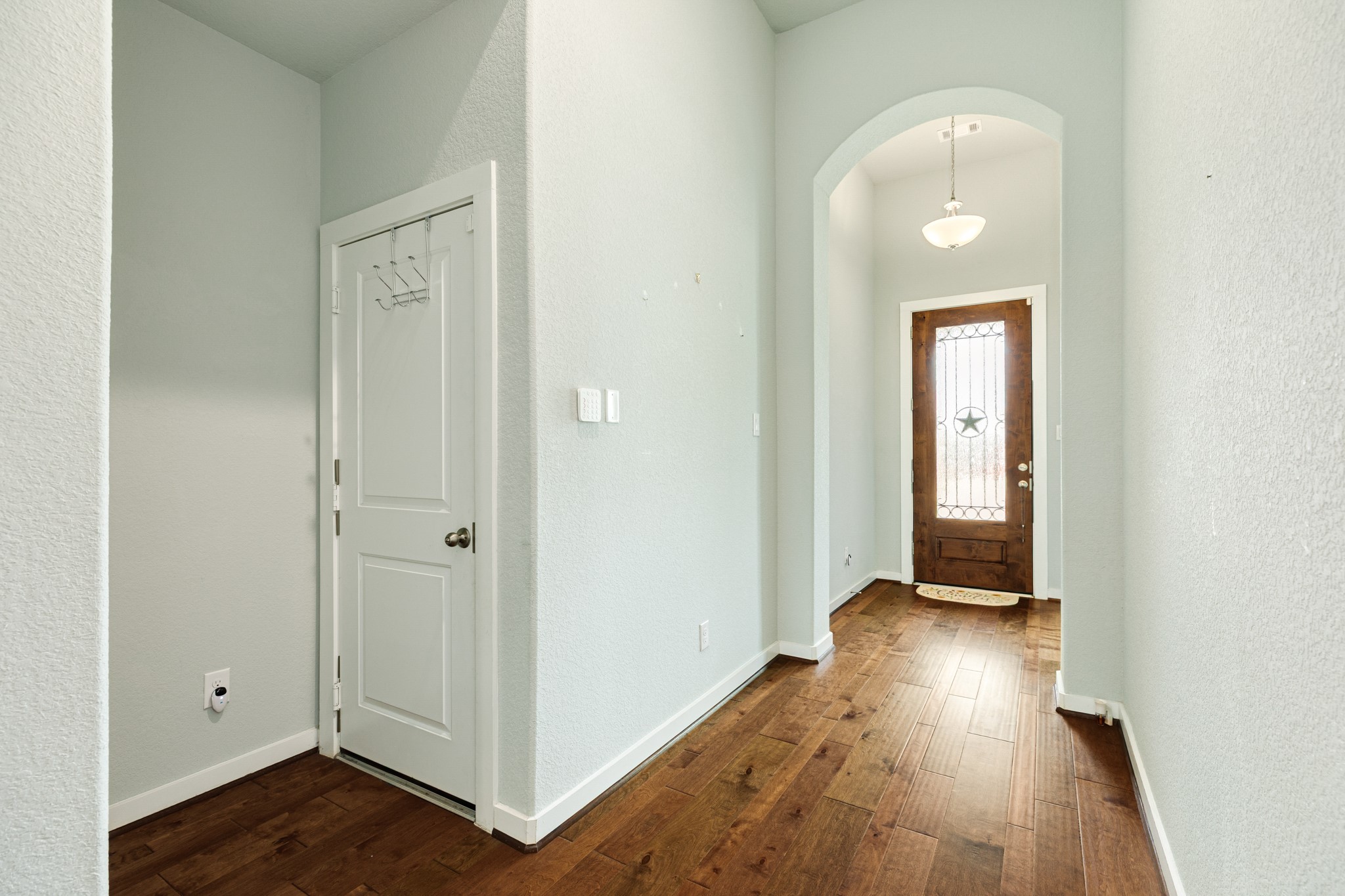 4015 Shackleton Court Iowa Colony, TX 77583 - Photo 50 of 50 his stunning open floor plan is very spacious and move-in ready. Shown here is the entry point located on the left, leading directly into the attached two-car garage.