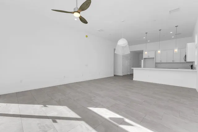 a bathroom with a glass door shower