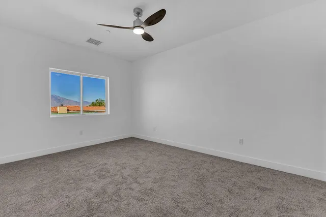 an aerial view of residential house with outdoor space