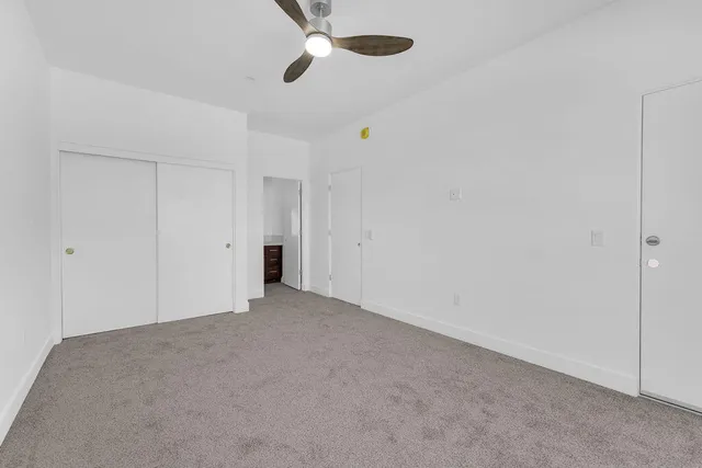 an aerial view of residential building and trees
