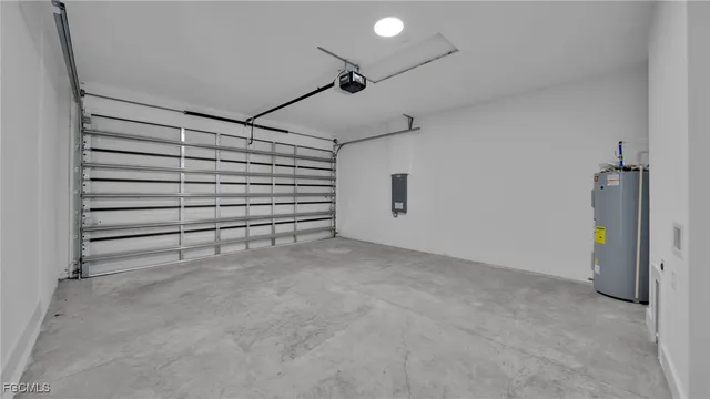 a view of an empty room with a garage