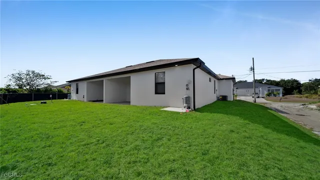a view of a backyard with garden