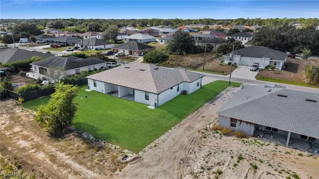 an aerial view of a house with a garden