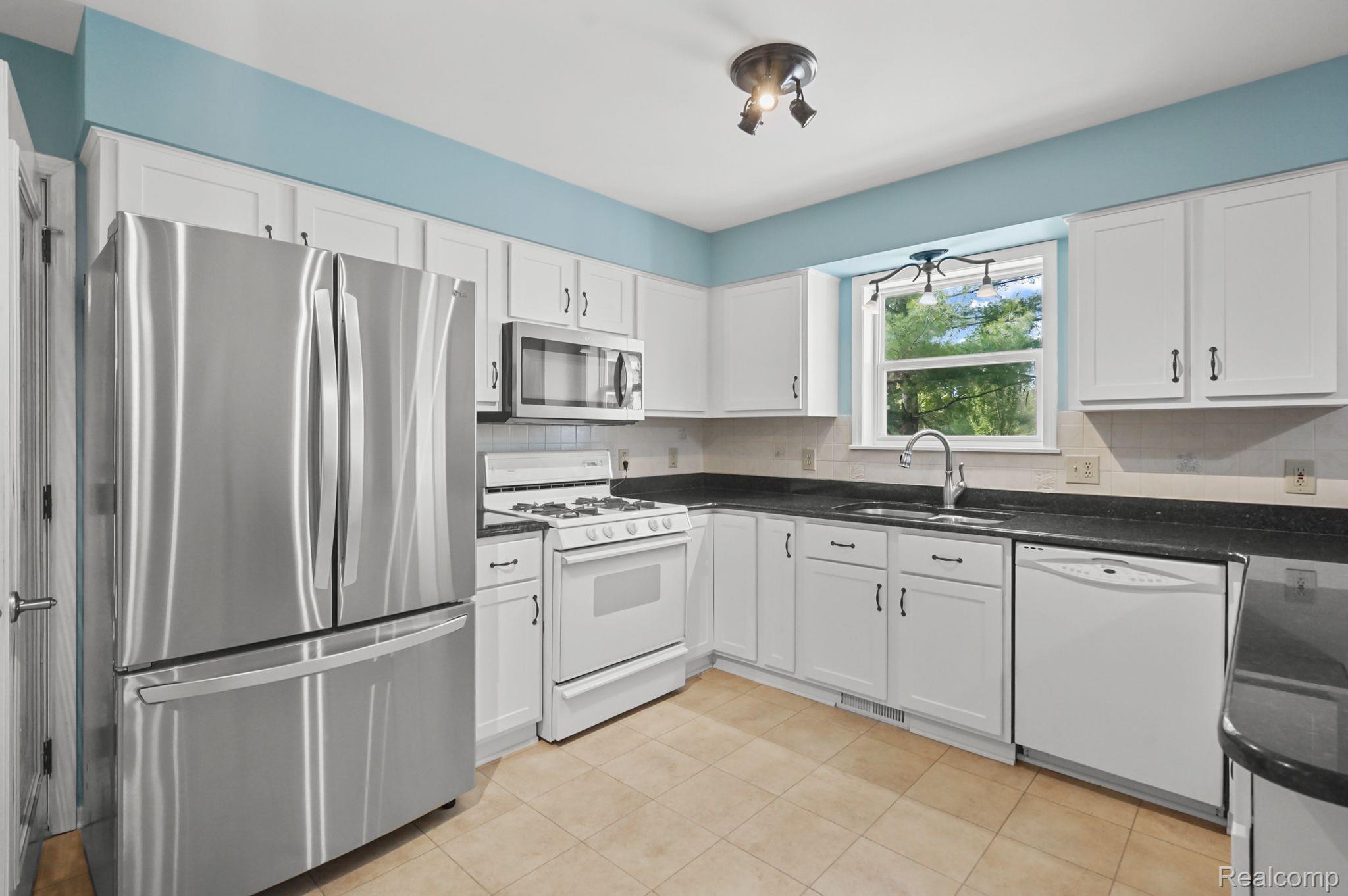 8312 Lambs Road Goodells, MI 48027 - Photo 13 of 46 Double door SS fridge