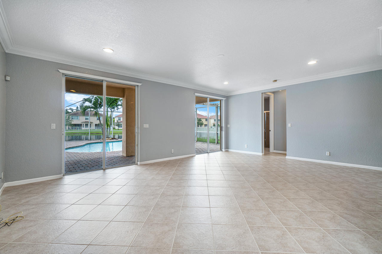 415 Mulberry Grove Road Royal Palm Beach, FL 33411 - Photo 11 of 39 a view of an empty room with a window