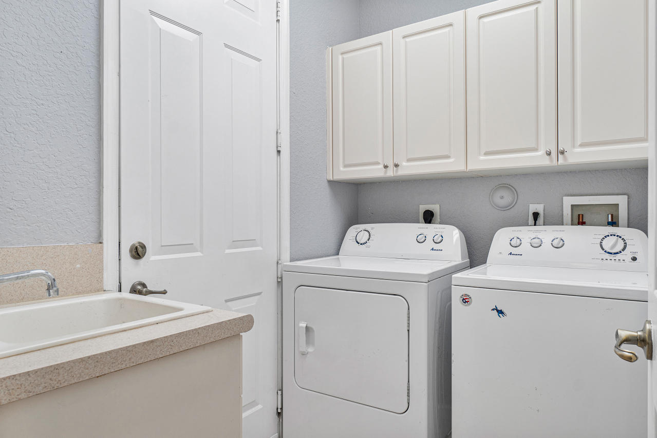 415 Mulberry Grove Road Royal Palm Beach, FL 33411 - Photo 14 of 39 a utility room with dryer and washer