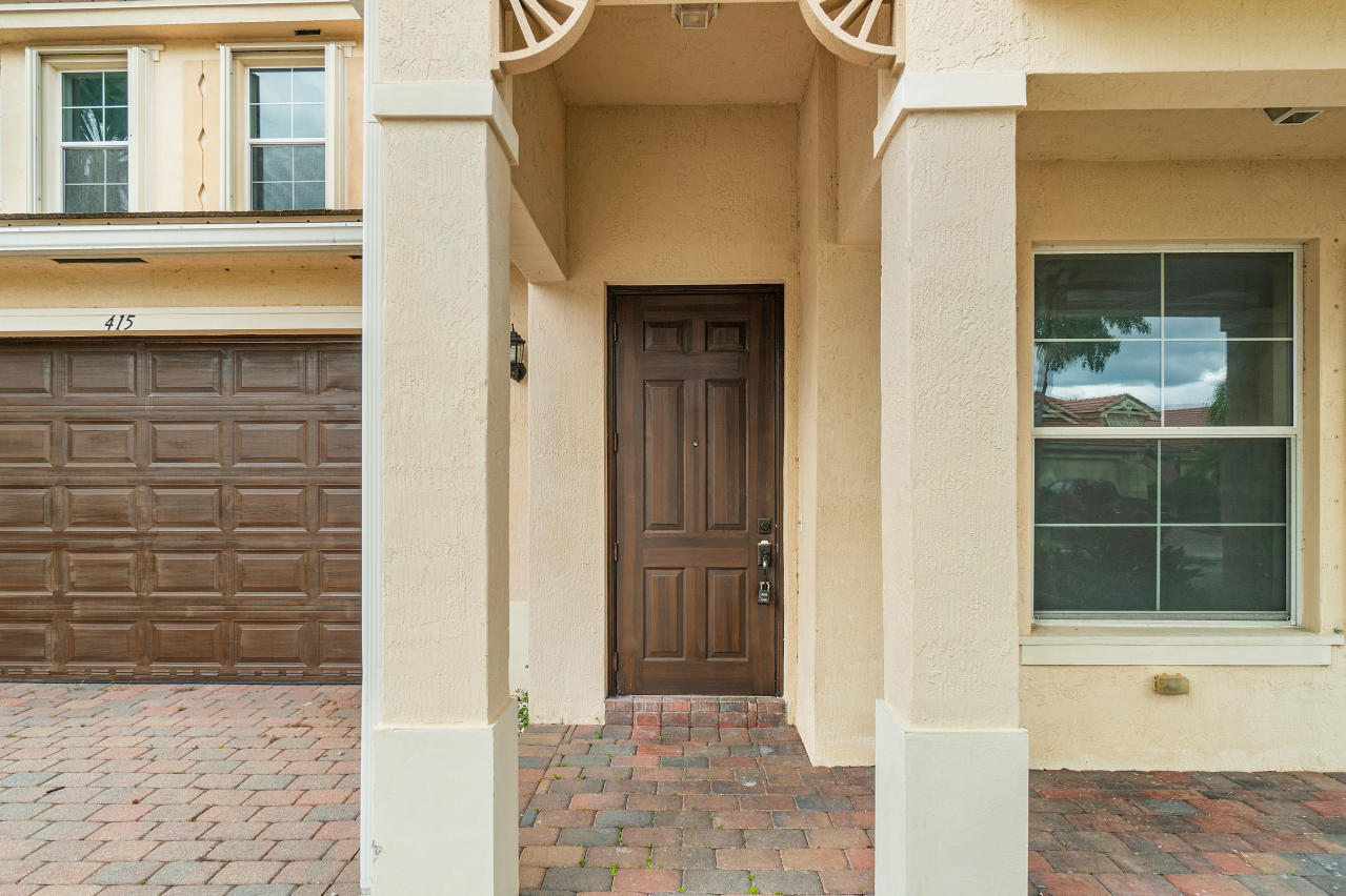 415 Mulberry Grove Road Royal Palm Beach, FL 33411 - Photo 2 of 39 a view of front door of house