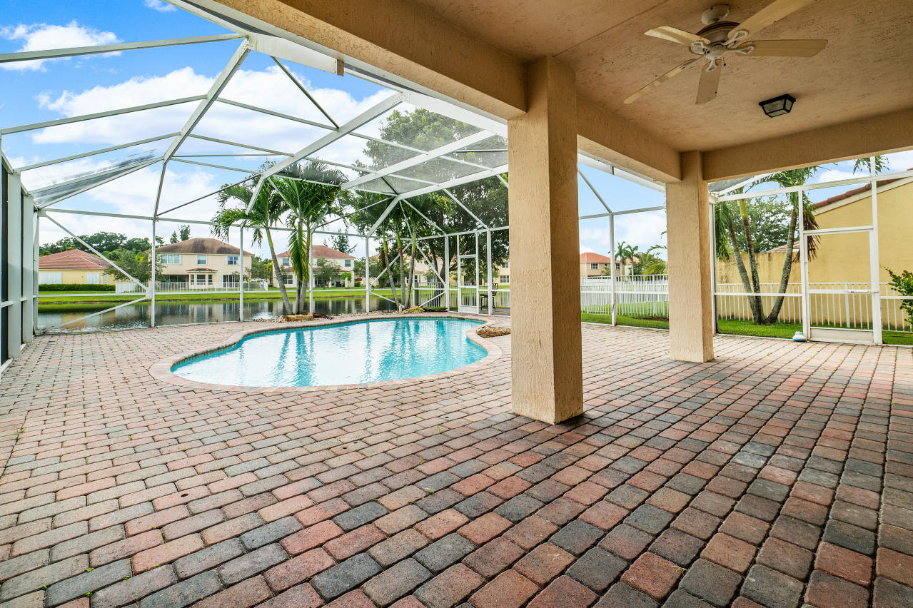 415 Mulberry Grove Road Royal Palm Beach, FL 33411 - Photo 27 of 39 a view of swimming pool with seating space