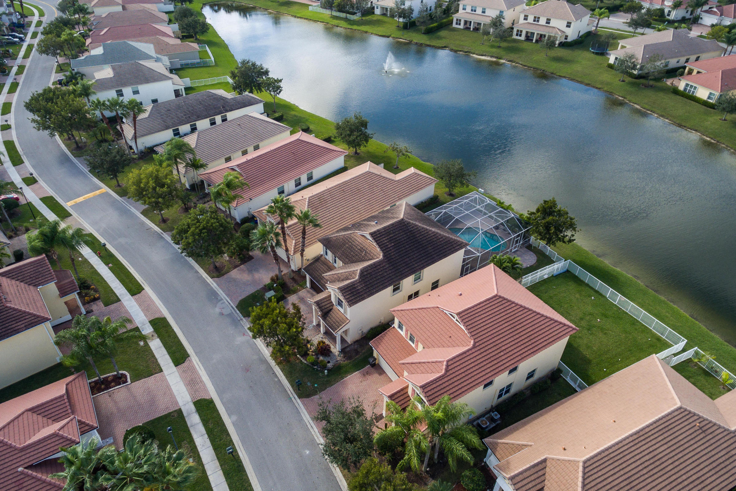 415 Mulberry Grove Road Royal Palm Beach, FL 33411 - Photo 36 of 39 an aerial view of a house with a garden and lake view