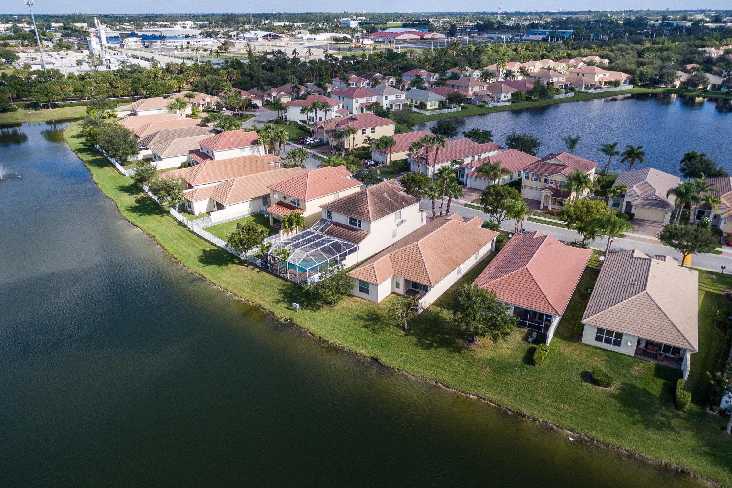 415 Mulberry Grove Road Royal Palm Beach, FL 33411 - Photo 37 of 39 an aerial view of a house with a lake view