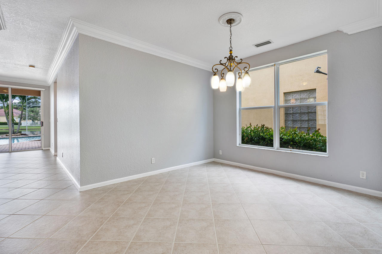 415 Mulberry Grove Road Royal Palm Beach, FL 33411 - Photo 5 of 39 a view of a chandelier in a room