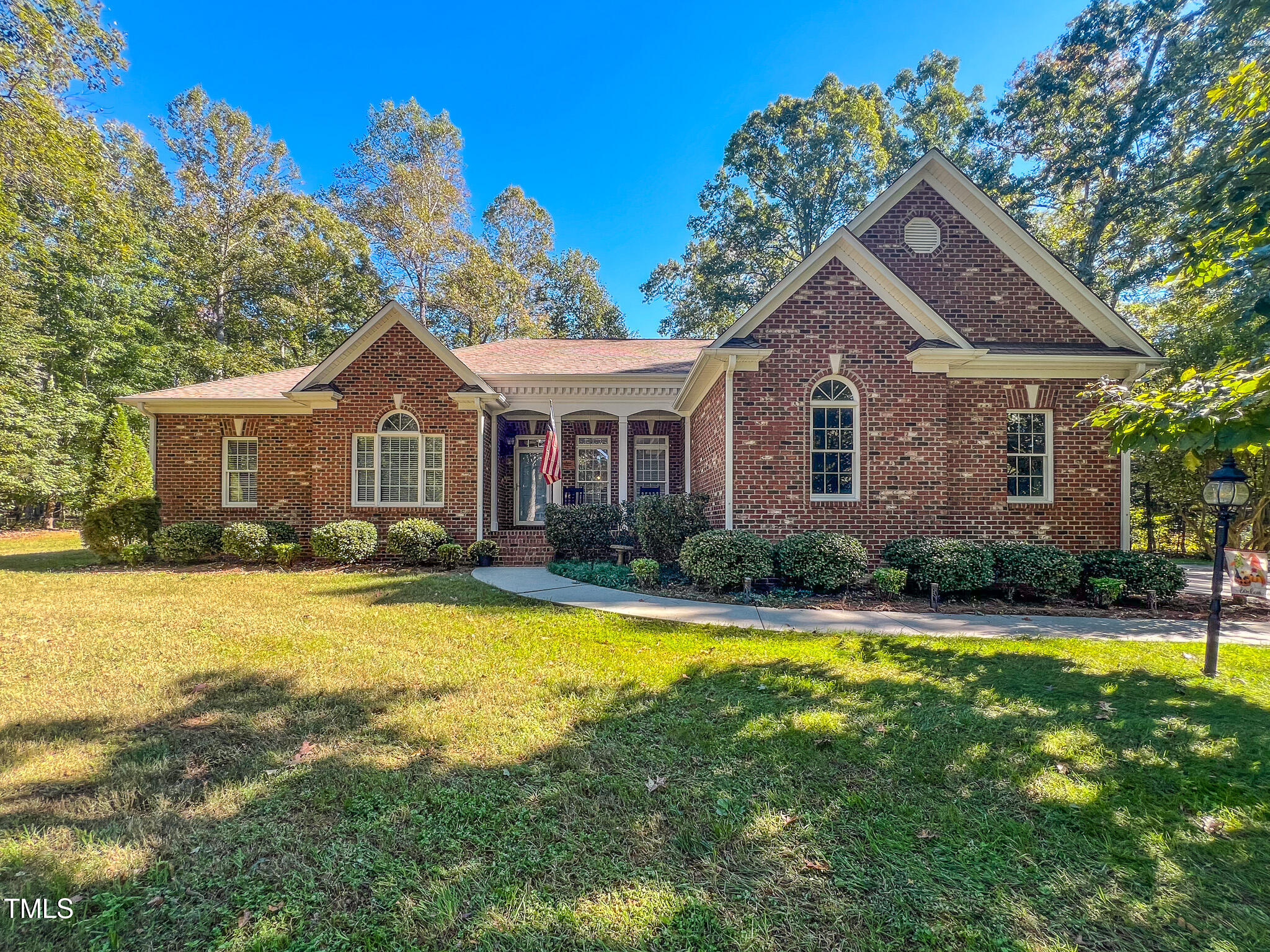 269 Oaks Lane Road Timberlake, NC 27583 - Photo 1 of 51 a front view of a house with yard and green space