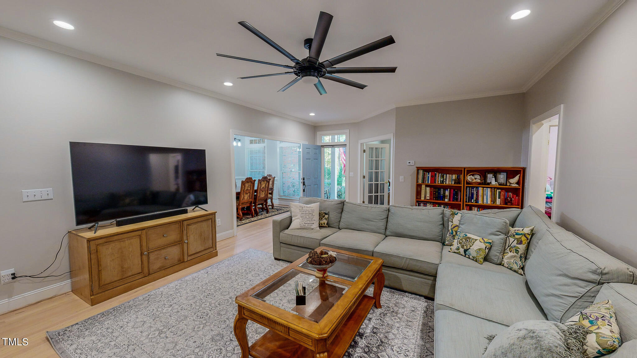 269 Oaks Lane Road Timberlake, NC 27583 - Photo 2 of 51 a living room with furniture and a flat screen tv