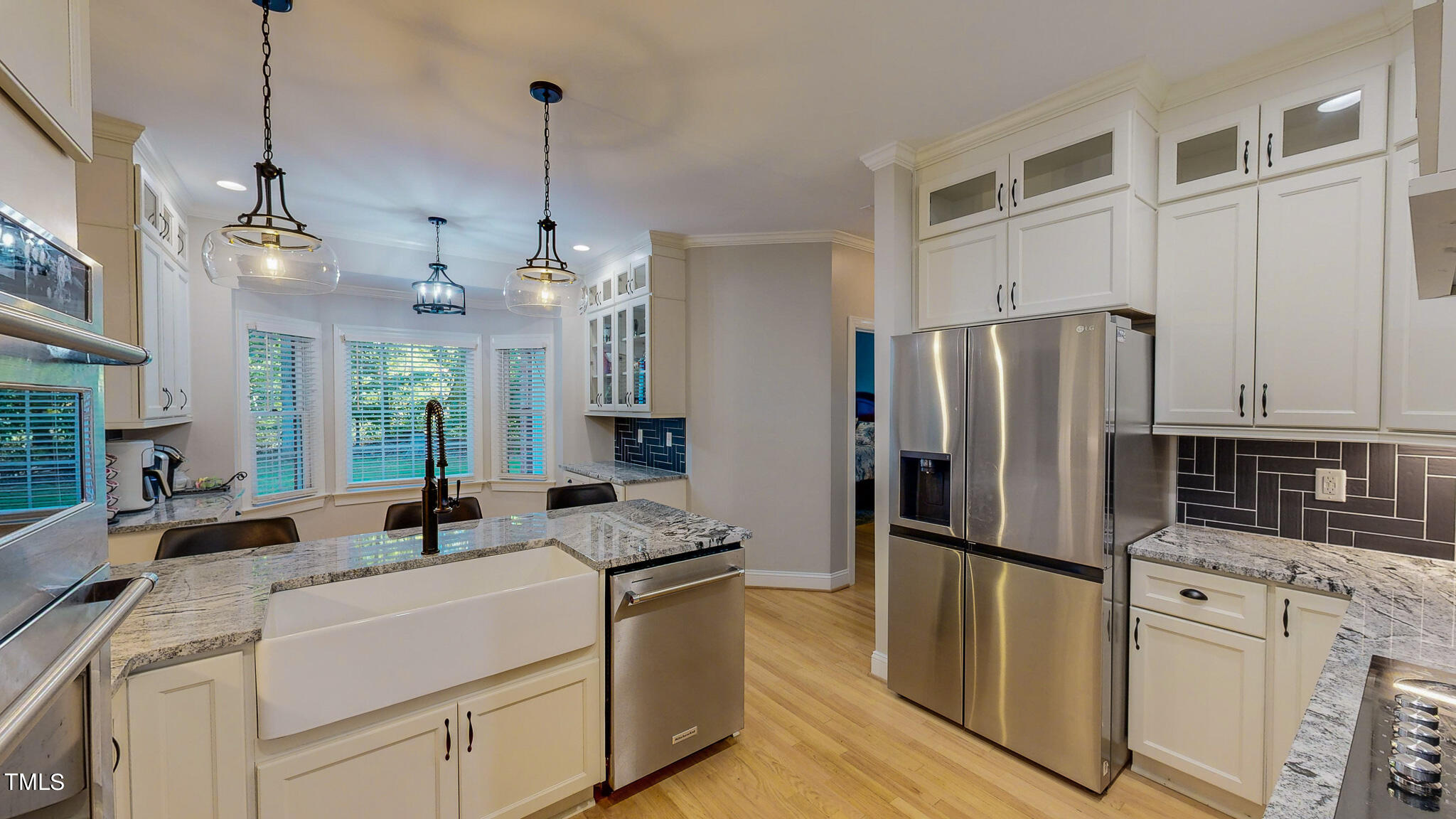 269 Oaks Lane Road Timberlake, NC 27583 - Photo 26 of 51 a kitchen with refrigerator cabinets and stainless steel appliances