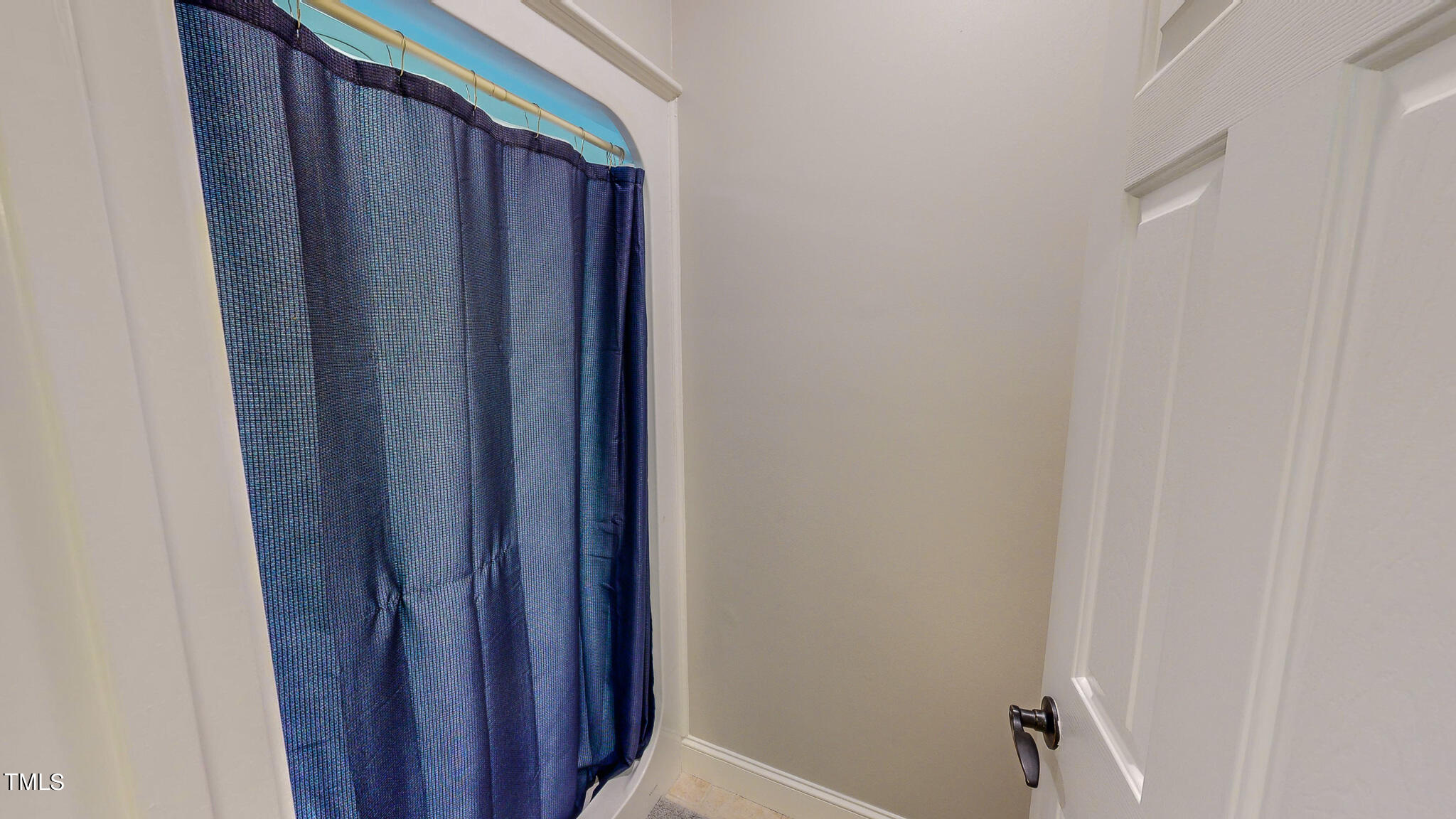 269 Oaks Lane Road Timberlake, NC 27583 - Photo 33 of 51 a bathroom with a shower and a window