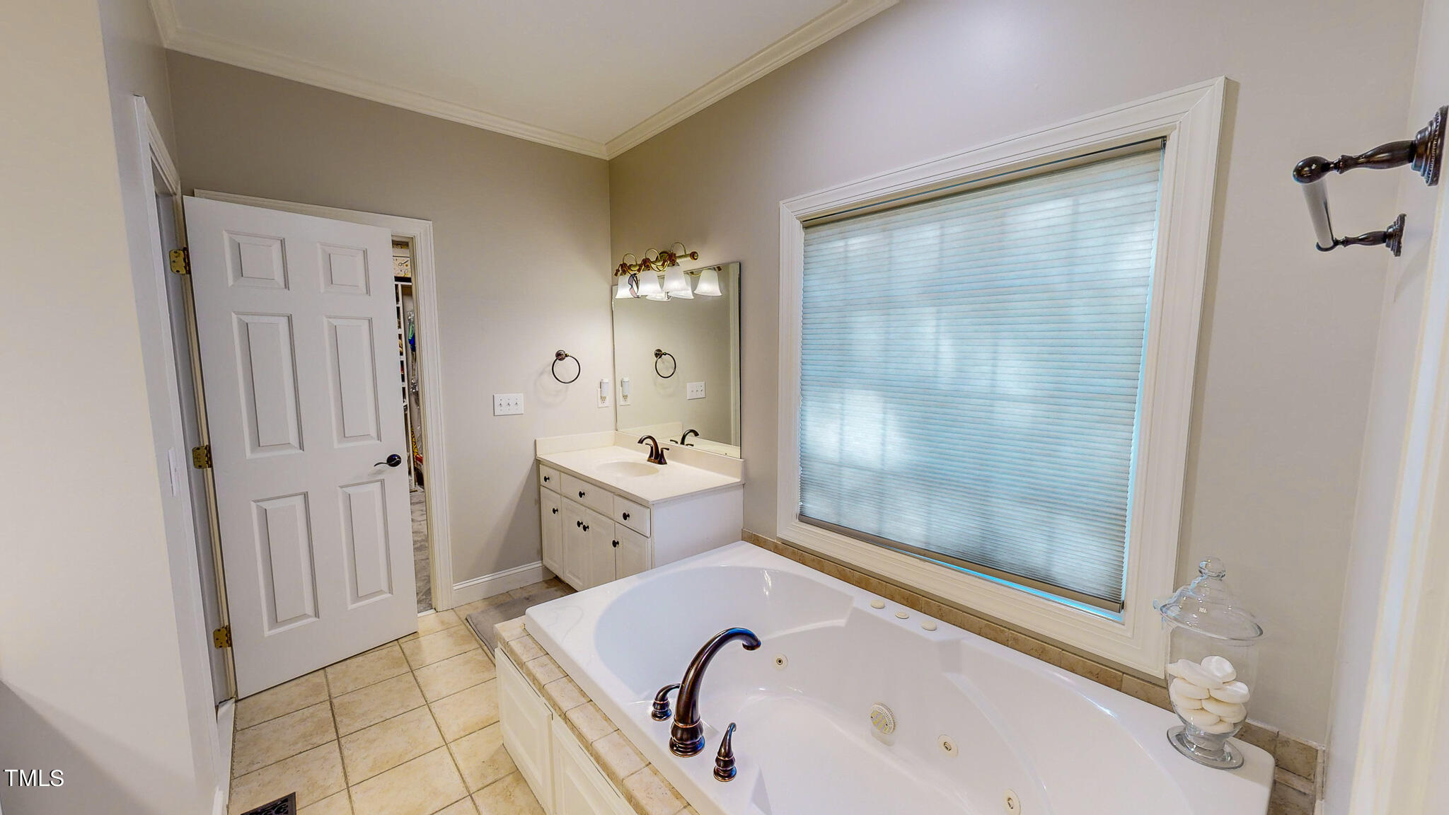 269 Oaks Lane Road Timberlake, NC 27583 - Photo 35 of 51 a bathroom with a tub sink and mirror