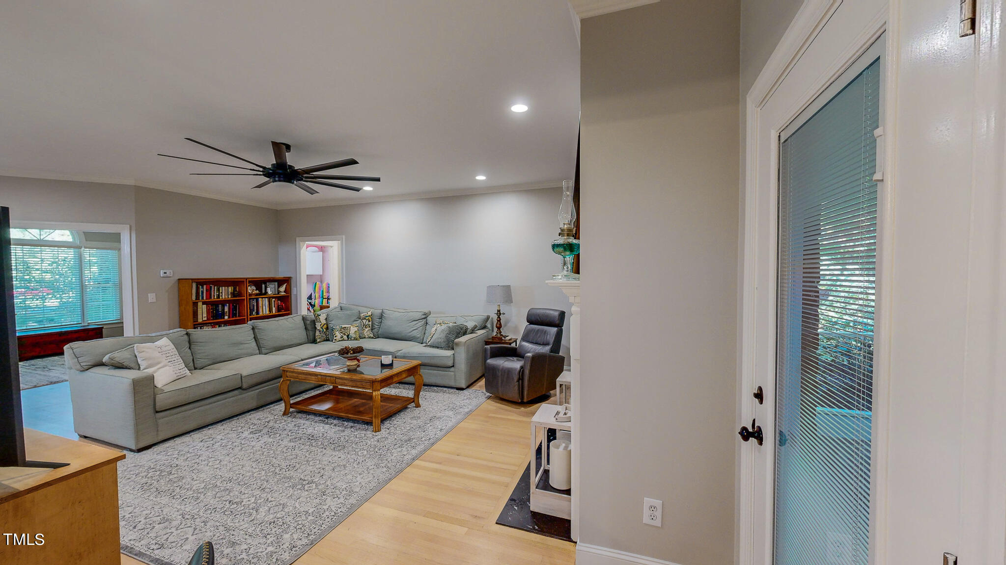 269 Oaks Lane Road Timberlake, NC 27583 - Photo 39 of 51 a living room with furniture and a ceiling fan