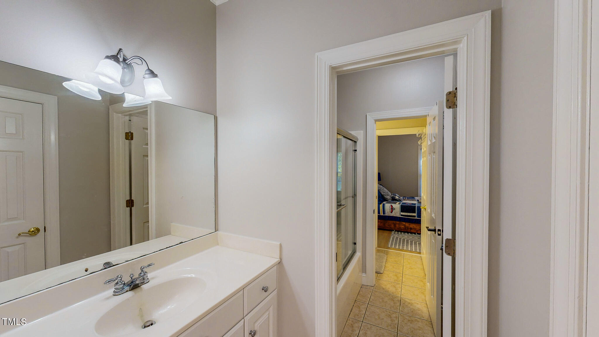 269 Oaks Lane Road Timberlake, NC 27583 - Photo 42 of 51 a en suite bathroom with a sink and mirror