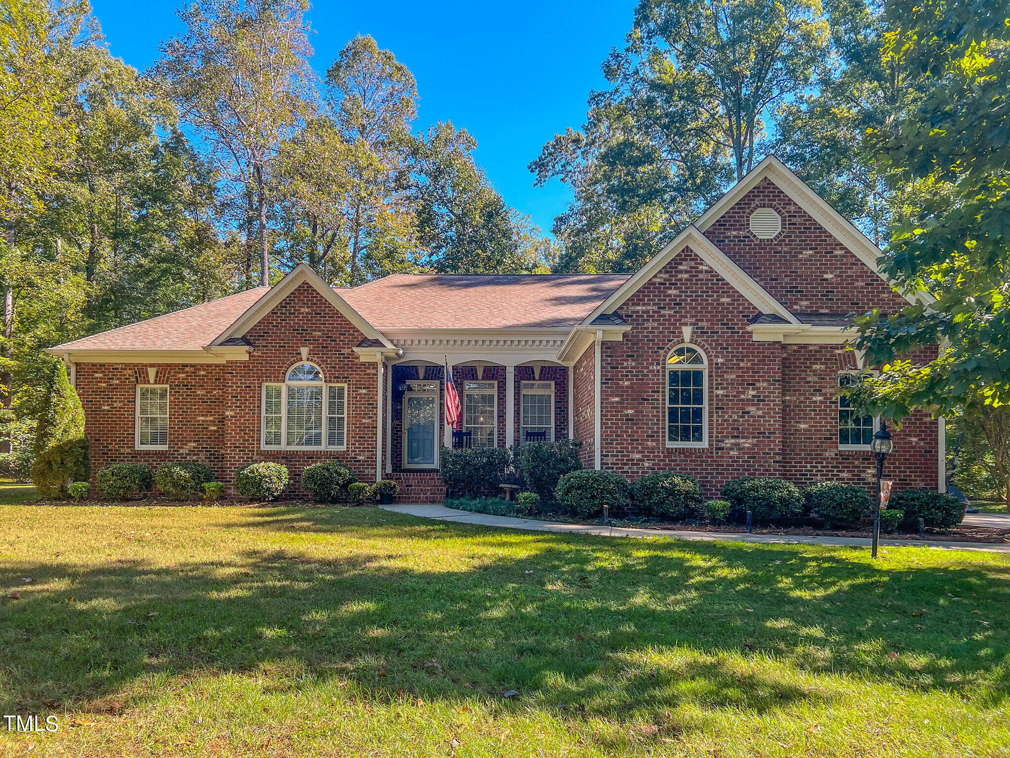269 Oaks Lane Road Timberlake, NC 27583 - Photo 47 of 51 a front view of a house with a yard