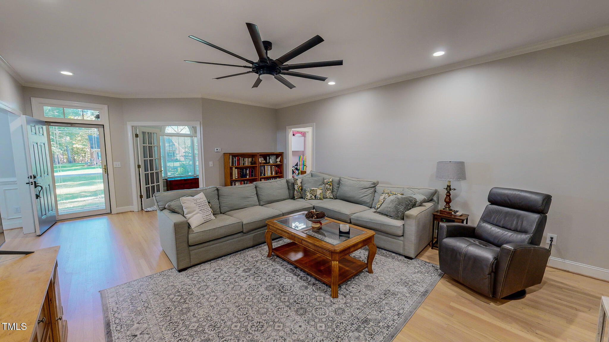269 Oaks Lane Road Timberlake, NC 27583 - Photo 9 of 51 a living room with furniture a window and a ceiling fan
